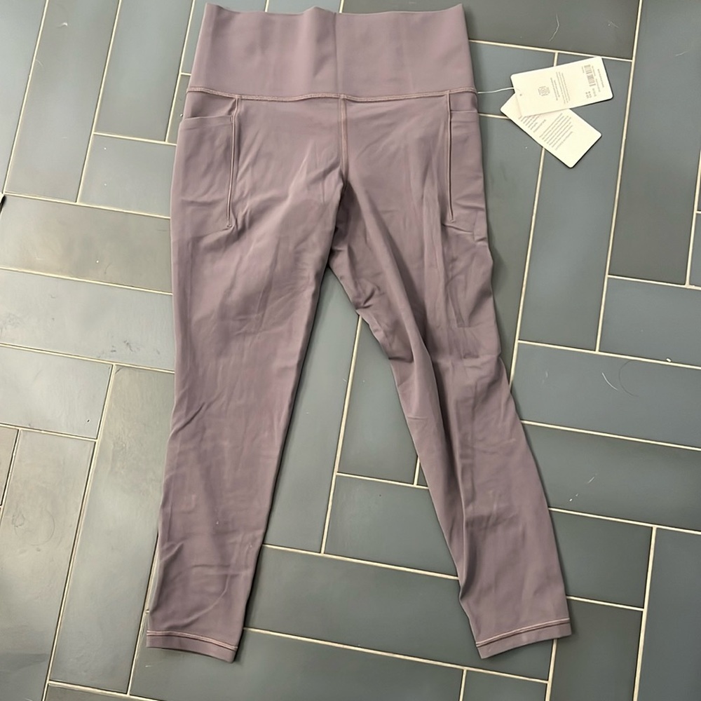 Athleta Salutation Stash Tight 7/8 Leggings